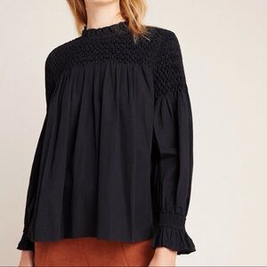 Anthropologie “maeve” modern peasant smoked top in black.  SZ  8